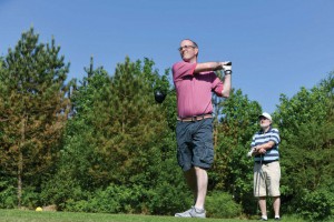 Golfer in mid swing